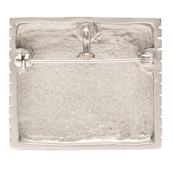 CHANEL logo brooch in silver metal for women